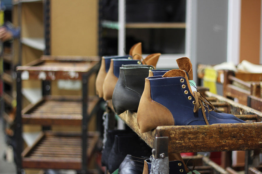 Lasted boots are awaiting soles to get affixed to the bottom.